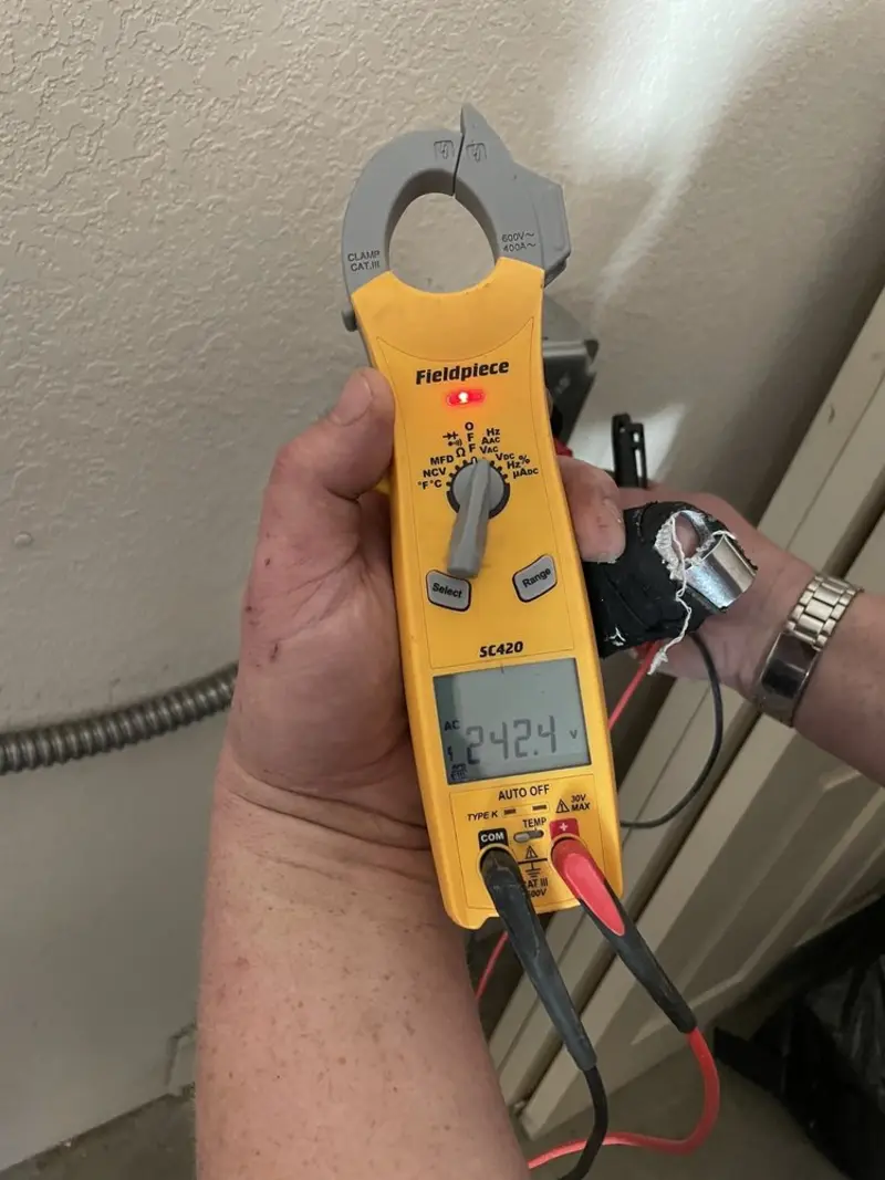 Voltage testing with clamp meter during Generator Installation in Viera West